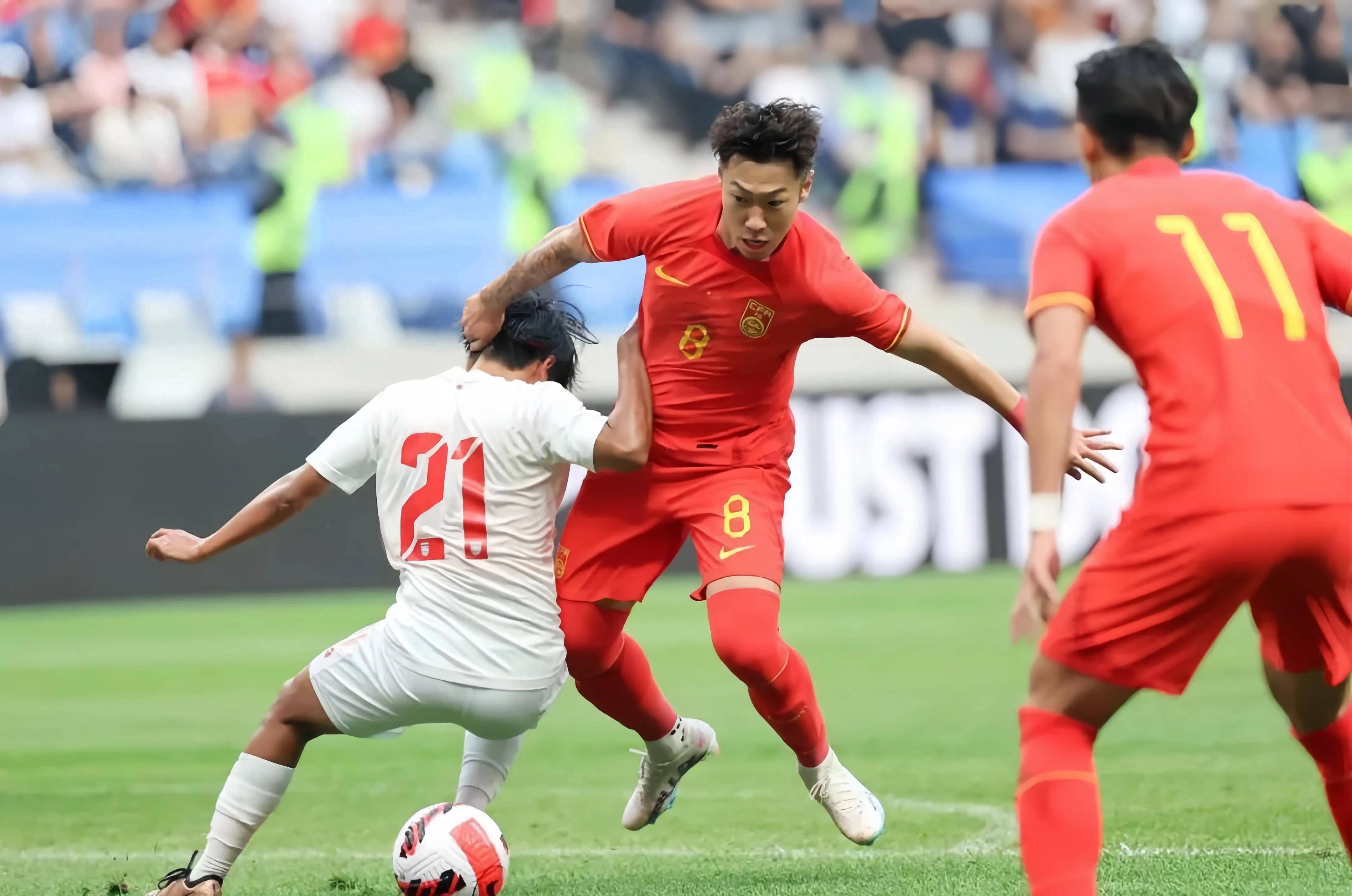 足球比赛中中国代表队崭露头角